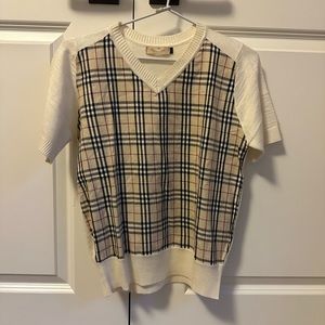 Burberry V neck short sleeve plaid and cream sweater. Size M.